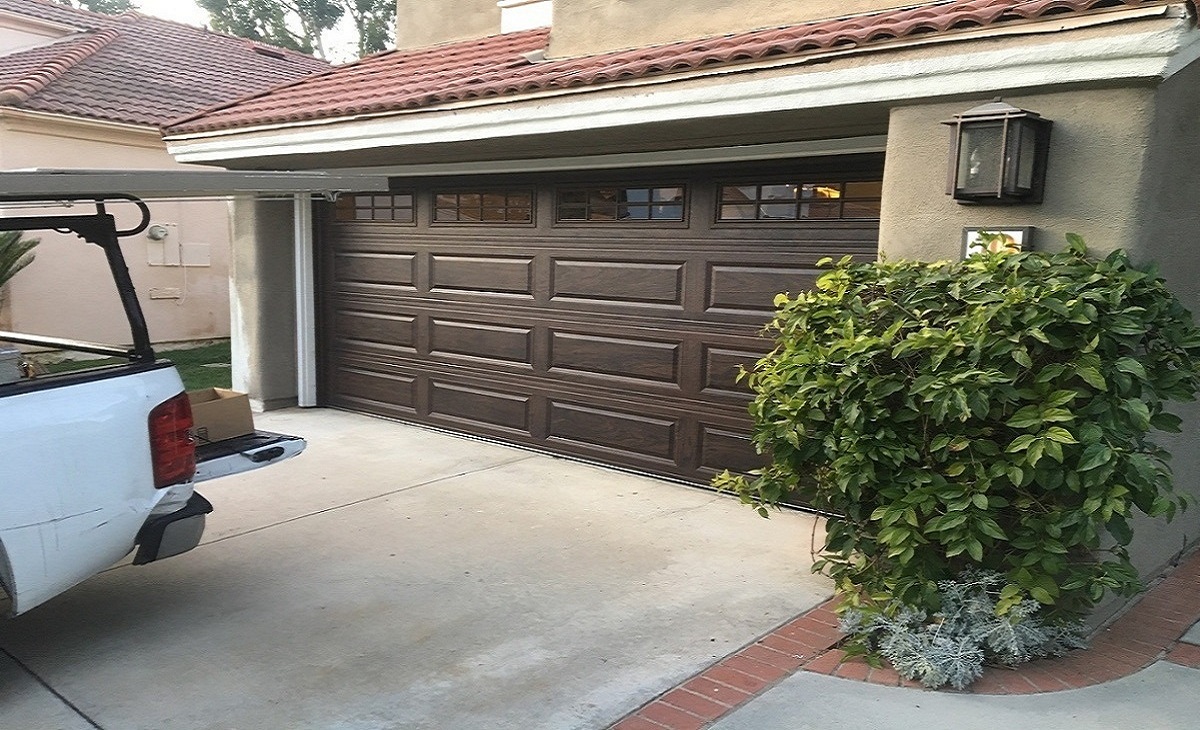 Dangers of Fixing a Damaged Garage Door On Your Own