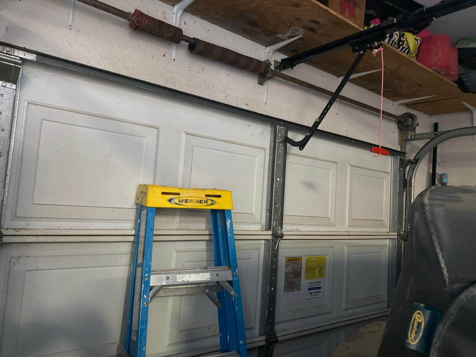 Hiring-a-Garage-Door-Spring-Repair