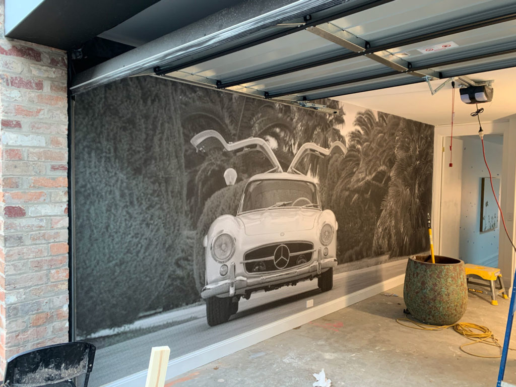 Peel And Stick Wallpaper To Make Your Garage Door Less Ugly Inside